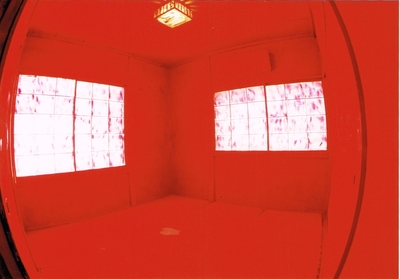 Redden room. Only the footprints from standing leave the color of the tatami.