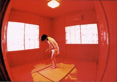 The red color approaches towards the feet that are on the ground. 