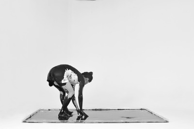 Forward bending pose: An upside-down U is written