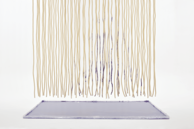 Horizontal plane of purple paint. A purple painting floating above it.
