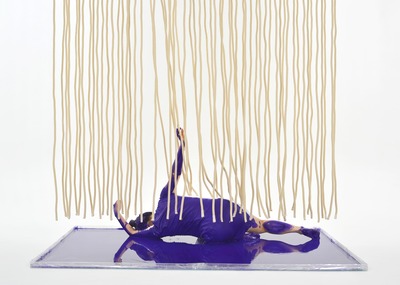 Hands reaching out to the ropes hanging like curtains.
