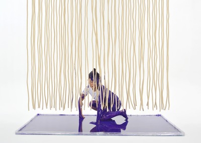 Squatting pose. purple paint gets on the rope.