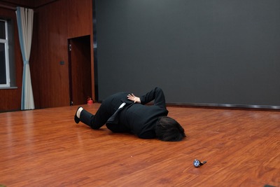 Placing a wristwatch, worn daily, on the stage floor